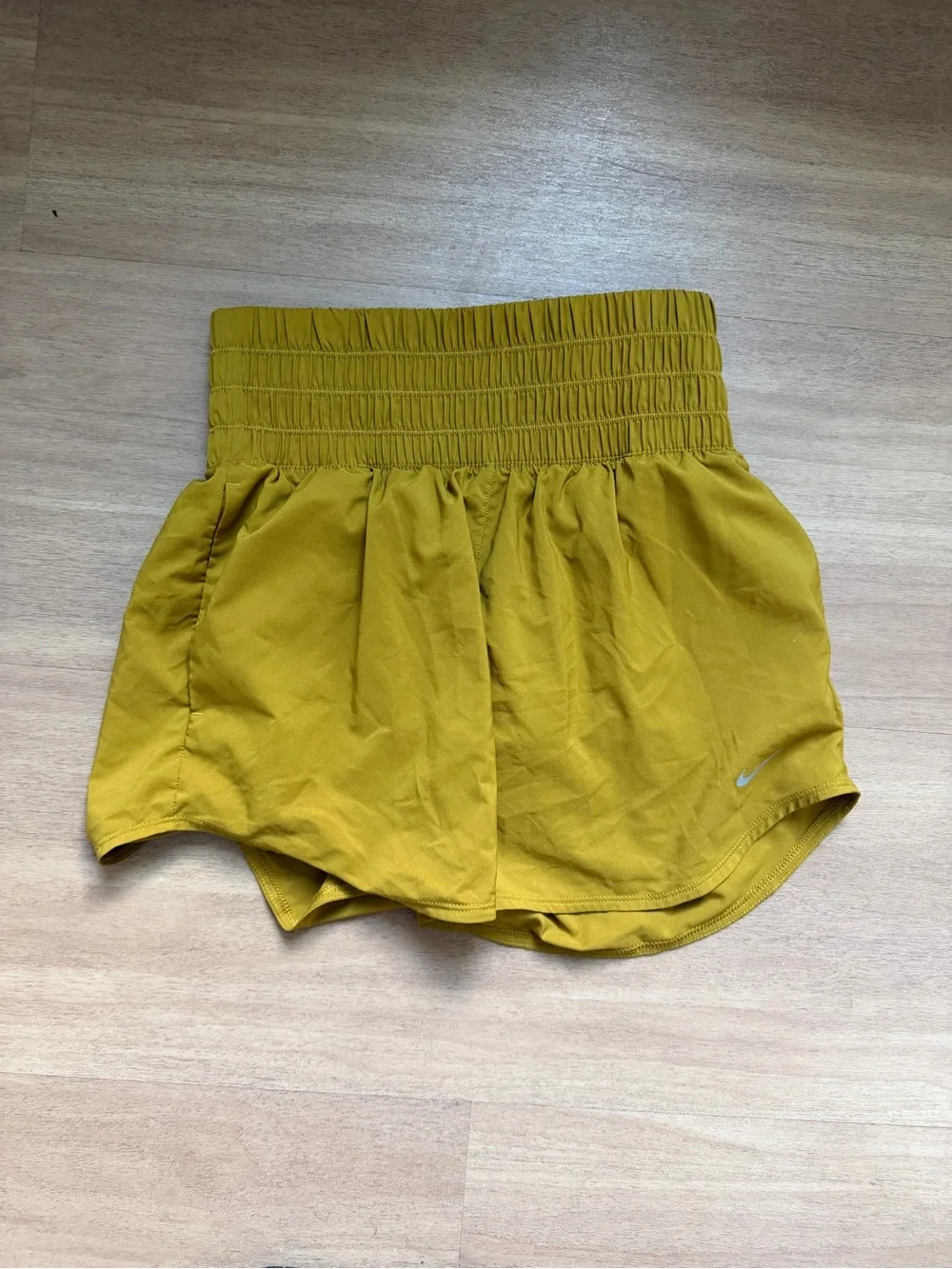 Nike Women’s Smocked Waist Mustard Yellow Athletic Shorts